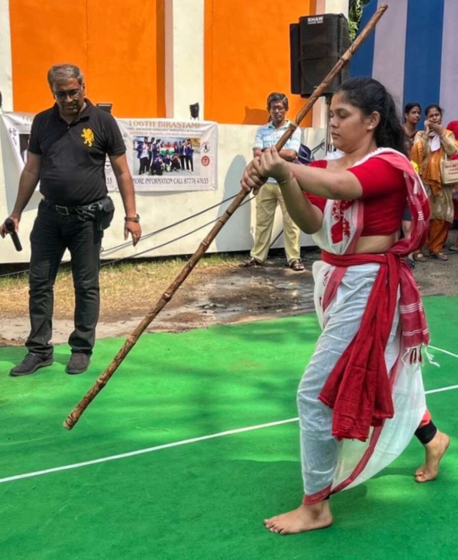 Baghbazar Sarbojonin’s Durga Puja celebrations featured the age-old traditional Bengali martial art known as ‘Lathi Khela’. This year, it was once again held on Ashtami, with two women showcasing the art form, representing strength, power and self-defence skills  