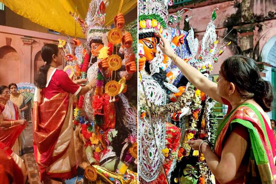 Before the visarjan, women of the Pathak family and women from the local communities and villages all gather for the boron and sindoor khela
