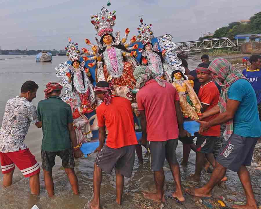 On Saturday, many Durga idols, especially those from family pujas and small neighbourhood pandals were immersed at the Baje Kadamtala Ghat in north Kolkata. Most of the big-budget idols will remain in the city for a few more days until the annual Durga Puja carnival on Red Road  