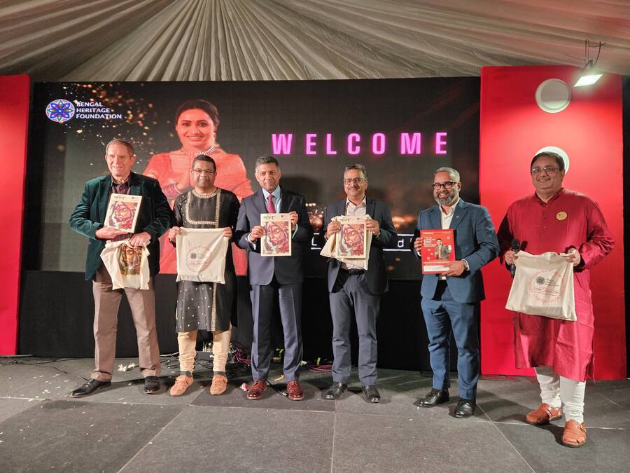 (L-R) Nick Low, ex-deputy high commissioner of UK to Kolkata; Suranjan Som, president Bengal Heritage Foundation (BHF); Vikram Doraiswami, high commissioner of India to UK; Deepak Chowdhury, minister coordination HCI; Kaustav Banerjee of ICICI and Sourav Niyogi, trustee of BHF at the launch of the Bengal Heritage Foundation’s Durga Puja magazine ‘Parboni’, at the London Sharad Utsav in Ealing, London