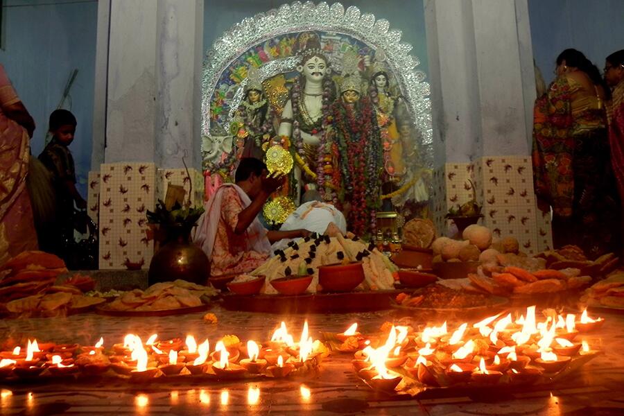 On Sandhi Puja, male members of the family light 108 lamps