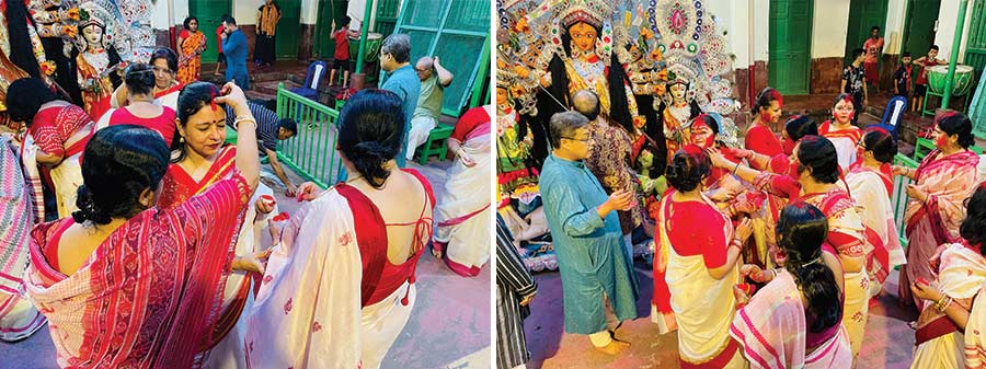 Sindoor Khela, a tradition where married women first apply ‘sindoor’ on Maa Durga, is followed by them playfully applying vermilion on each other. It begins in a restrained manner, with the first touch of sindoor placed gently on the forehead, as seen in the left picture. But it soon turns into a joyful celebration, where the goal is to cover every bit of skin with the bright vermilion powder, leaving no one untouched