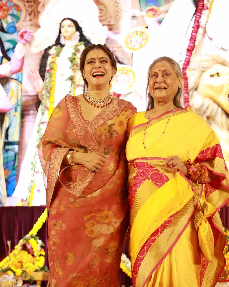 Kajol and Jaya Bachchan were all smiles while posing for the lens in front of the Durga idol.