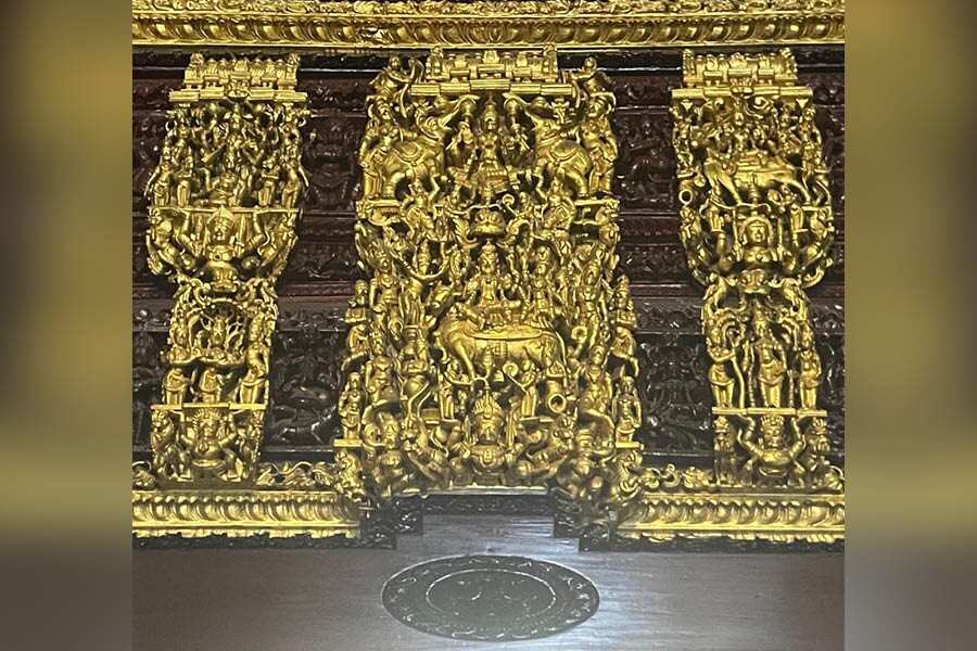 An extravagant gilded teak ornamentation on a Chettiar mansion doorway