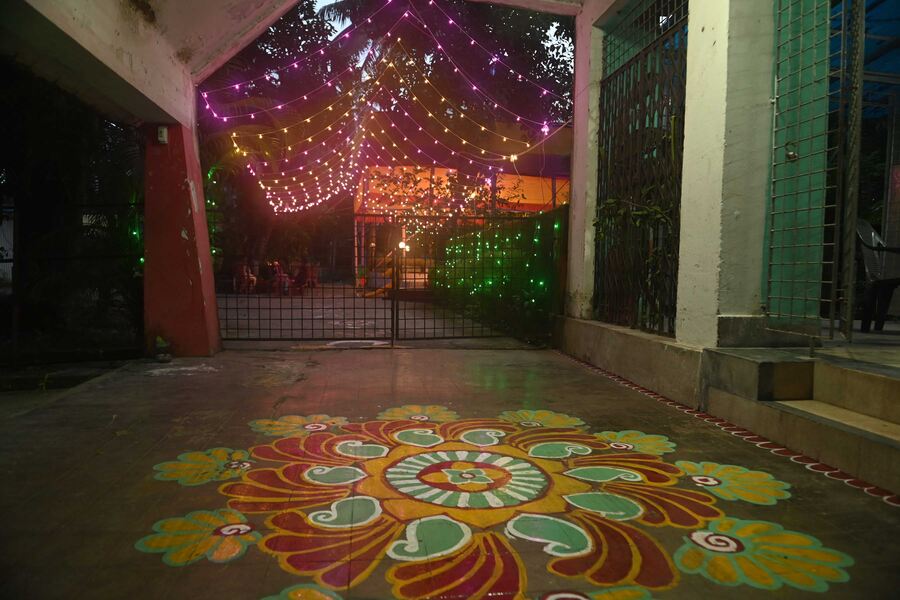  The girls at the NGO, which was founded in 1989, painted a beautiful ‘alpona’ at the entrance to the pandal