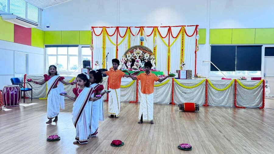 A cultural programme was held where the young and old put up various performances. In picture, children perform in front of the goddess