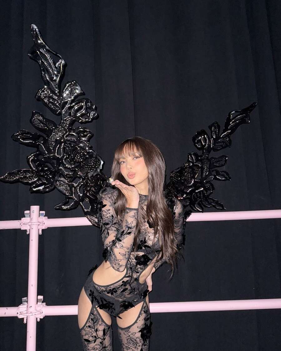 The New Woman singer’s next eye-catching ensemble was a black lace-embroidered catsuit featuring sequinned floral embellishments. Worn during the performance of Moonlit Floor, the outfit featured cut-outs on the waist and thighs. Black wings gilded with gold on her back rounded off her sultry angel look. “Finally got my wings,” she wrote about her outfit.