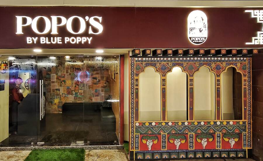 Popo’s by The Blue Poppy recently opened doors at 4,1, Middleton Street, Kankaria Estate (the building next to Sikkim House). The 36-seater restaurant serves dishes with Chinese and Tibetan influences that pay homage to Sachiko’s grandfather, Dorjee Wang, fondly called Popo. The waiting area of the eatery is inspired by Popo’s noodle factory while the indoors is sure to take you to the high peaks of Tibet