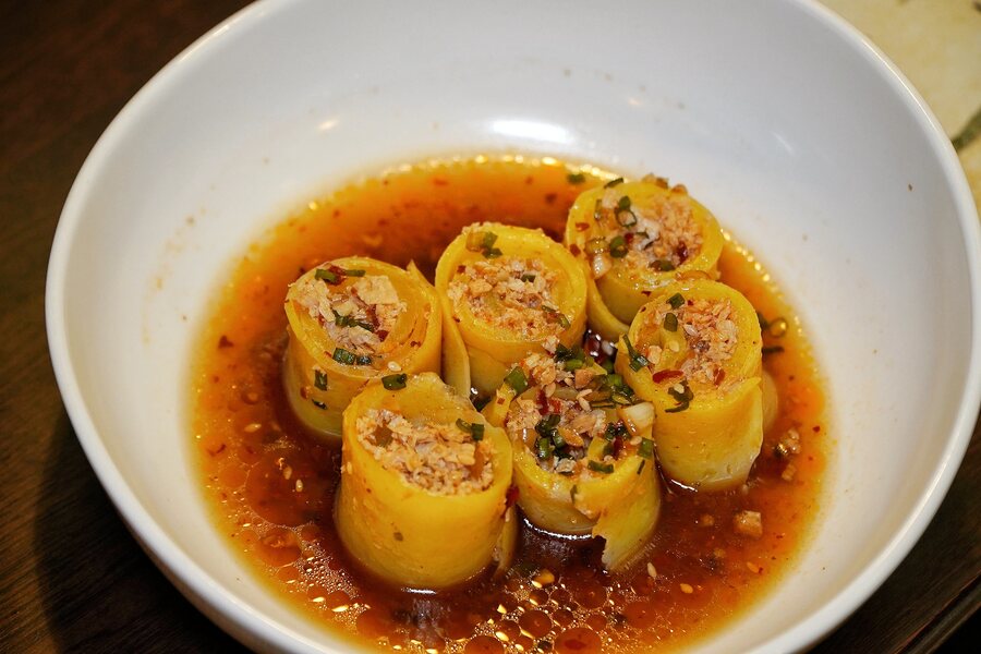 The Sesame Chilli Lepphing has flat thick noodles rolled up to pack in chicken, chillies, garlic and more. It’s placed in a bowl of a light garlic chilli sauce that is not very harsh on the tongue. ‘Popo would say that if there is something that you want to eat, you should learn to cook it,’ said Sachiko