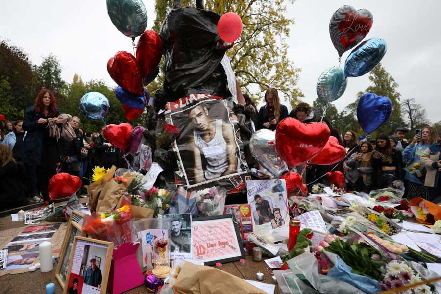 Fans gather to pay tribute to former One Direction singer Liam Payne in Hyde Park, London, Britain, October 20, 2024.