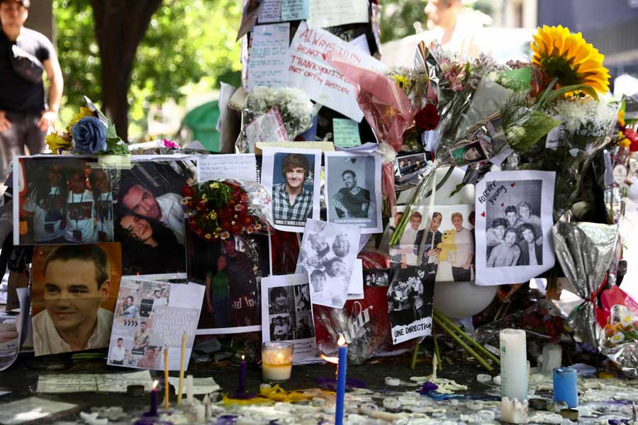 Tributes are left outside the hotel where Liam Payne was found dead in Buenos Aires, Argentina. 