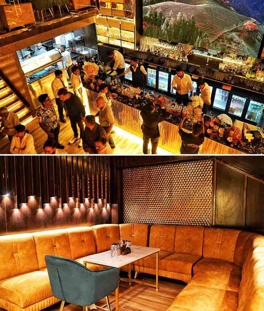 You are greeted by the bar as you enter the venue, and the rest of the club spreads out before you. The ground floor has (bottom) private sections on either side with high tables going down the middle of the wooden floor