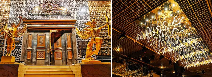 Two interior features that caught our eye at The Flamboyant are the grand, almost glittering entrance, flanked by gleaming Roman style statues, and a beautiful ceiling light setting that looks like a flock of glowing birds
