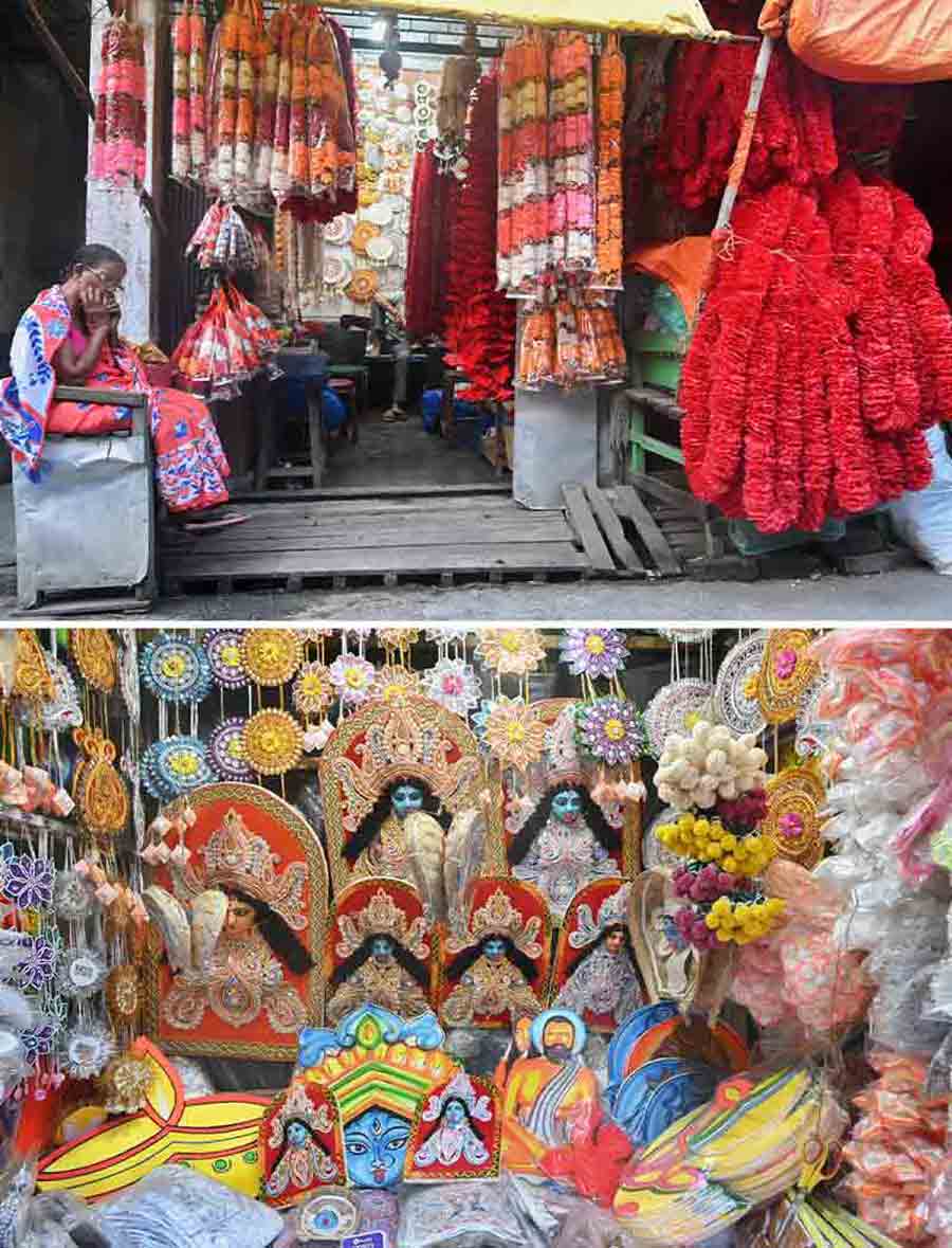 With colourful garlands, other puja paraphernalia and Diwali decorative items, shopkeepers in Kumartuli await customers 