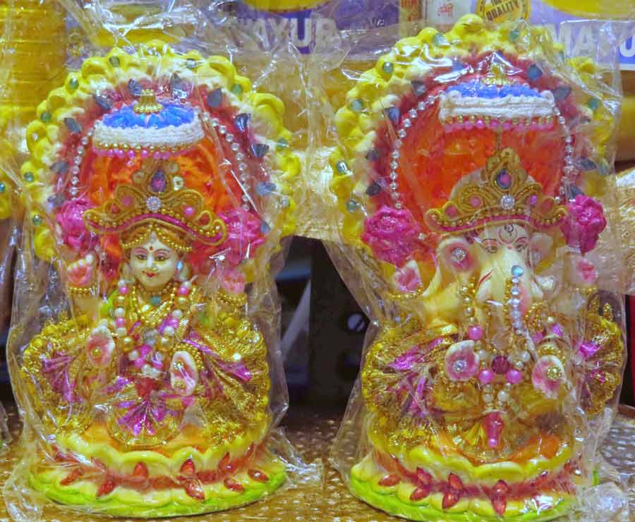 Lakshmi and Ganesh idols on sale ahead of Diwali at a ‘dasakarma bhandar’ at Janbazaar near Esplanade. The siblings are worshipped together on Diwali because their worship is said to usher good fortune, wealth and prosperity into the home 