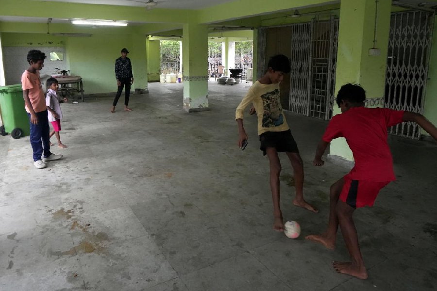 Children play football at a relief camp at Digha after the landfall of Cyclone ‘Dana’, in Purba Medinipur district, West Bengal, Friday, Oct. 25, 2024.