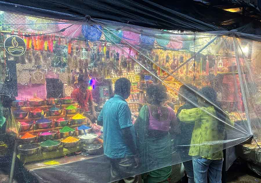 With Dhanteras on October 29 and Diwali soon after, the shops in Burrabazar cannot afford to lose a single day’s business and so used transparent polythene sheets to guard up against intermittent rain in Kolkata on Friday triggered by the landfall of Cyclone Dana in neighbouring Odisha 