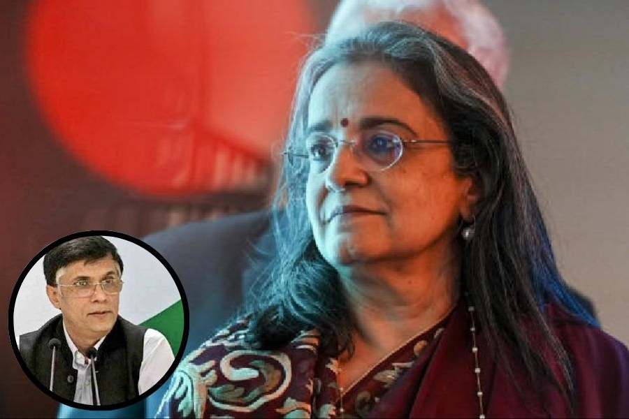 Rahul Gandhi with Mallikarjun Kharge, who completes two years as Congress president, in New Delhi on Saturday.