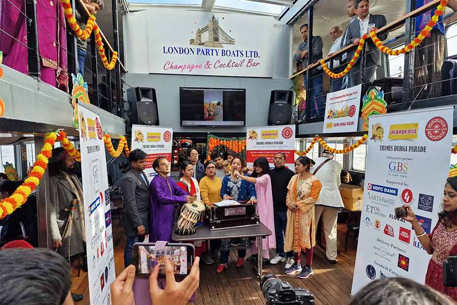 A double-storey boat sailed on the Thames while playing Bhatiyali songs
