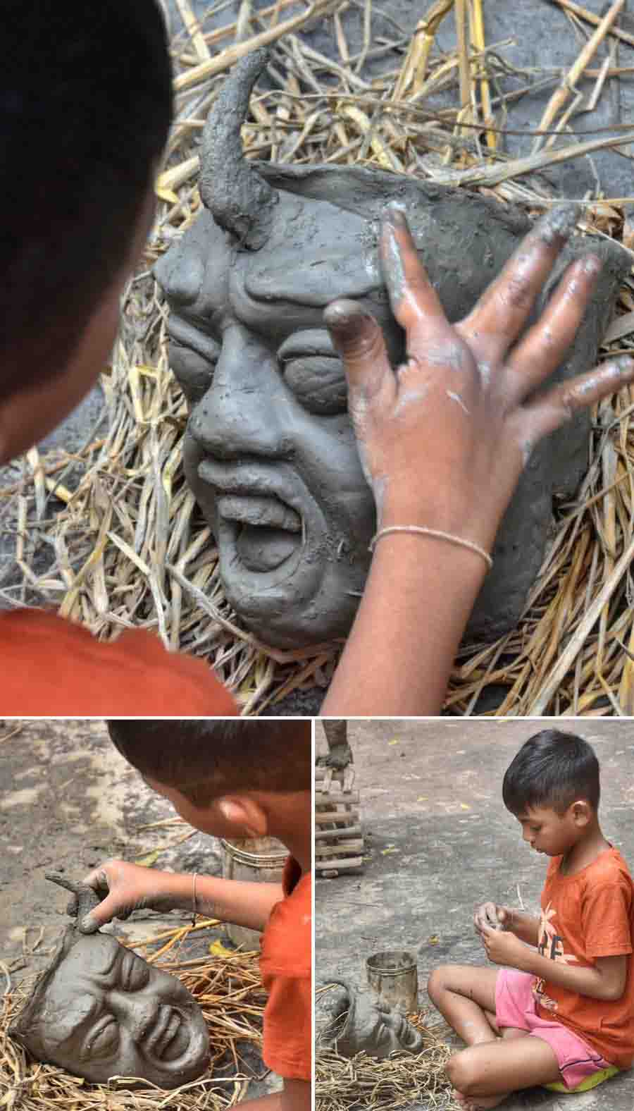 Aditya Purakayet, an eight-year-old artisan in Kumartuli, engrossed in crafting a Dakini-Jogini model to accompany that of goddess Kali in a puja pandal