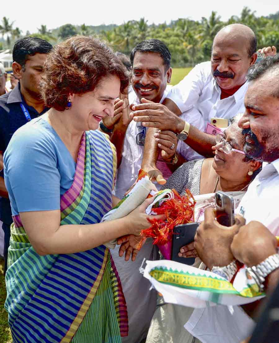 Congress General Secretary Priyanka Gandhi Vadra being greeted on her arrival, in Meenangadi, Kerala, Monday, Oct. 28, 2024.