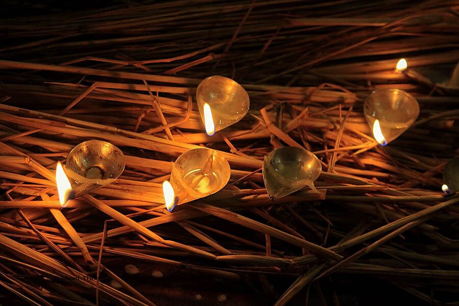 Some of the 108 brass lamps that are lit and kept on hay spread on the stairs of the ‘thakur dalan’