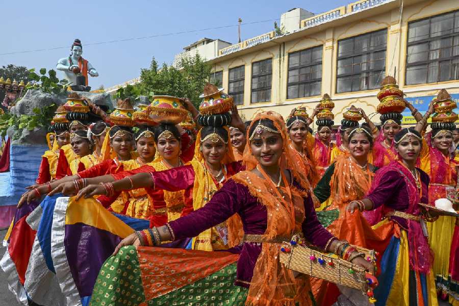 Dancers add life to the event. PTI
