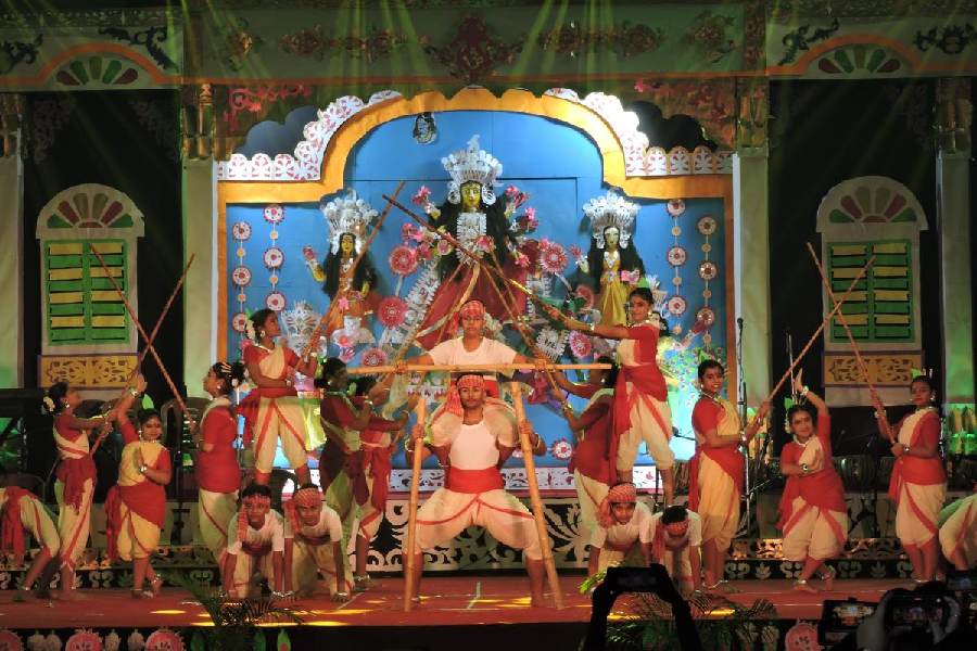 Students and teachers of the art department at Delhi Public School, Newtown, create a Durga idol that forms the backdrop to their dance drama