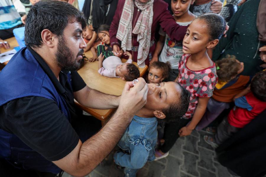 A Palestinian child is vaccinated against polio, at a United Nations healthcare center in Deir Al-Balah in the central Gaza Strip, September 1, 2024