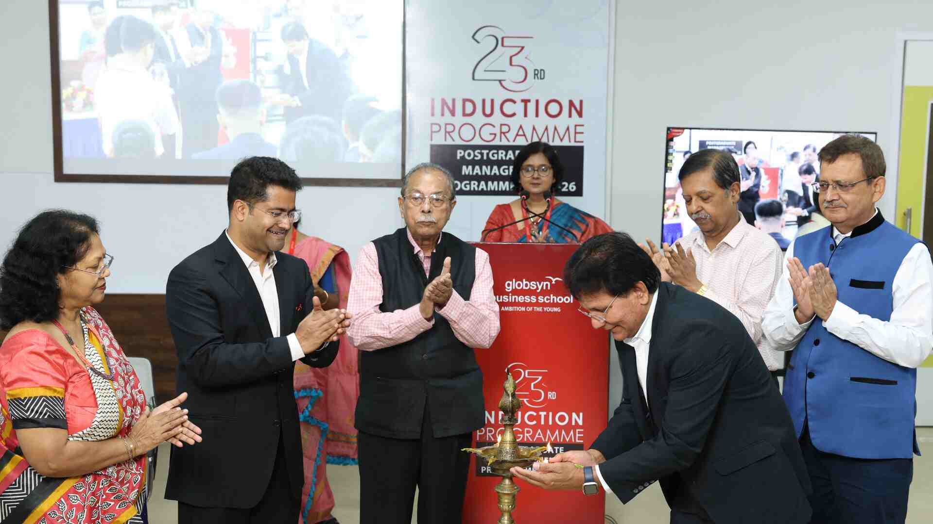 Ceremonial lighting of the lamp, marking an auspicious beginning to the Induction Programme for the students pursuing MBA (Global). (L to R) Ranjana Dasgupta, Trustee, Globsyn Knowledge Foundation; Rahul Dasgupta, Director & Trustee, GBS; Prof RC Bhattacharya, Vice Chairman, Globsyn Group; Dr Premkumar Rajagopal, President, Malaysia University of Science and Technology;  Prof Swagata Sen, Professor, Department of Commerce, University of Calcutta and Governing Council Member, GBS; Anil Kumar Garg, former Head – Finance & IT, Personal Care Business, ITC Limited and Academic Council Member, GBS.