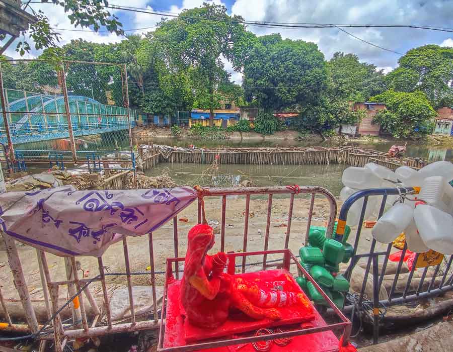 A new ghat is being constructed on the banks of the Adi Ganga at Kalighat