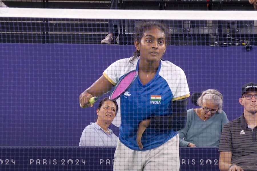 Indian para-badminton player Thulasimathi Murugesan during her women's singles SU5 badminton event match at the Paralympics 2024, in France. Murugesan won the silver medal in the event.