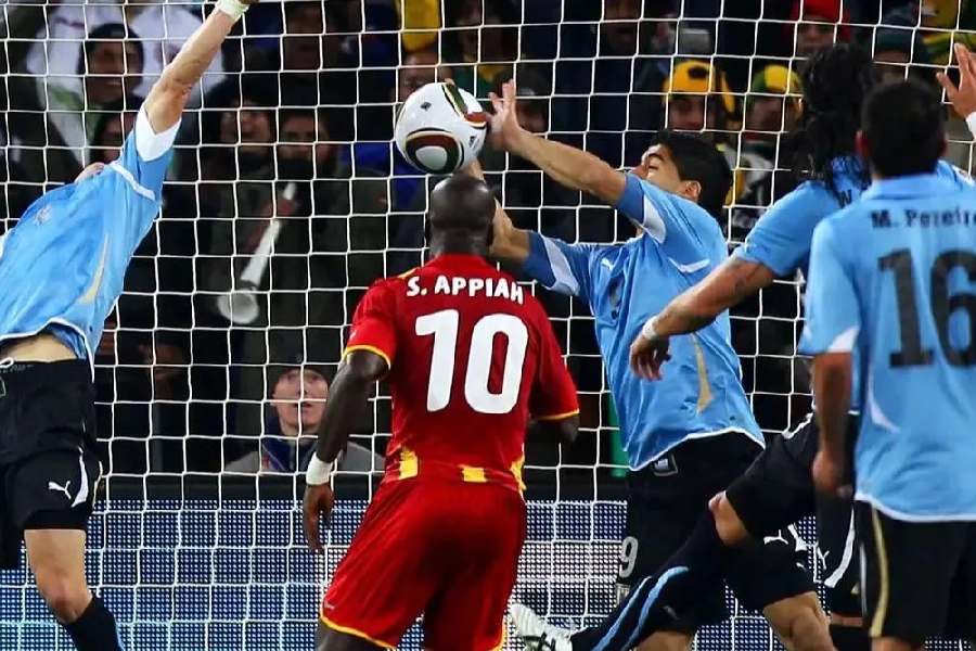 Luis Suarez uses his hand to stop Ghana’s Dominic Adiyiah’s effort on goal in 2010 FIFA World Cup quarterfinal.