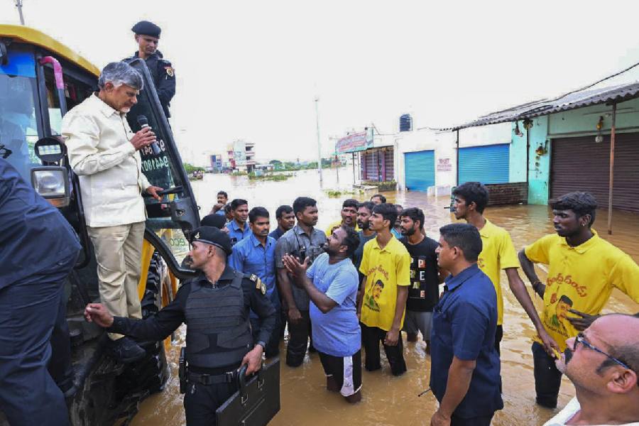 Chief Minister N Chandrababu Naidu interacts with affected people during his visit to the flood-affected areas, in Vijayawada on 3rd Sept