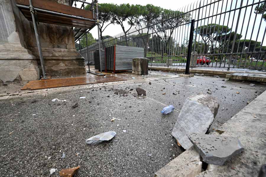 Fragments of Constantine's Arch lie on the ground after lightning struck it during a storm in Rome, Italy September 3, 2024. 