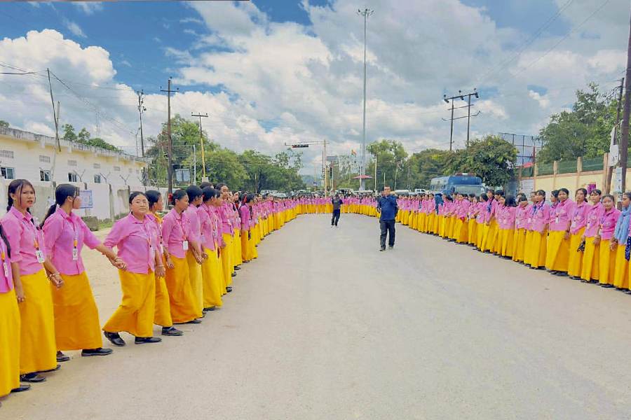 Students of a girls' school take part in a human chain rally on September 6, 2024 to protest against the recent drone and gun attacks in Manipur's Koutruk and Senjam Chirang.