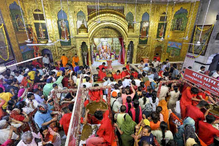 Devotees offer prayers at Moti Dungri Ganesh Temple on the eve of the ‘Ganesh Chaturthi’ festival, in Jaipur.