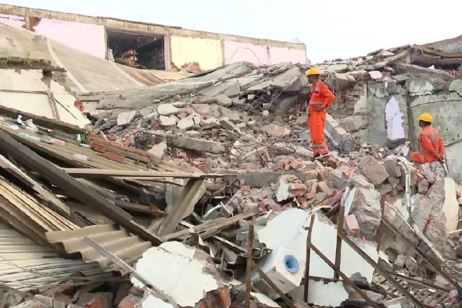 Relief work underway a day after a building collapsed causing 8 people death, in Lucknow, Sunday, Sept. 8, 2024.