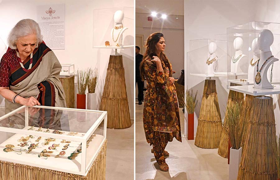 Guests look at the jewellery designed by Kundal Lal Verma and Vinesh Kumar Maheshwari 