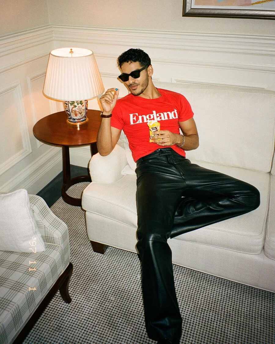 Ishaan sports a red t-shirt paired with black leather pants and black shades. “Chaotic BTS featuring Shooter and Amelia’s choice of dessert. Also, spilled the tea. Have you seen the perfect couple yet,” he captioned the pictures on Instagram.