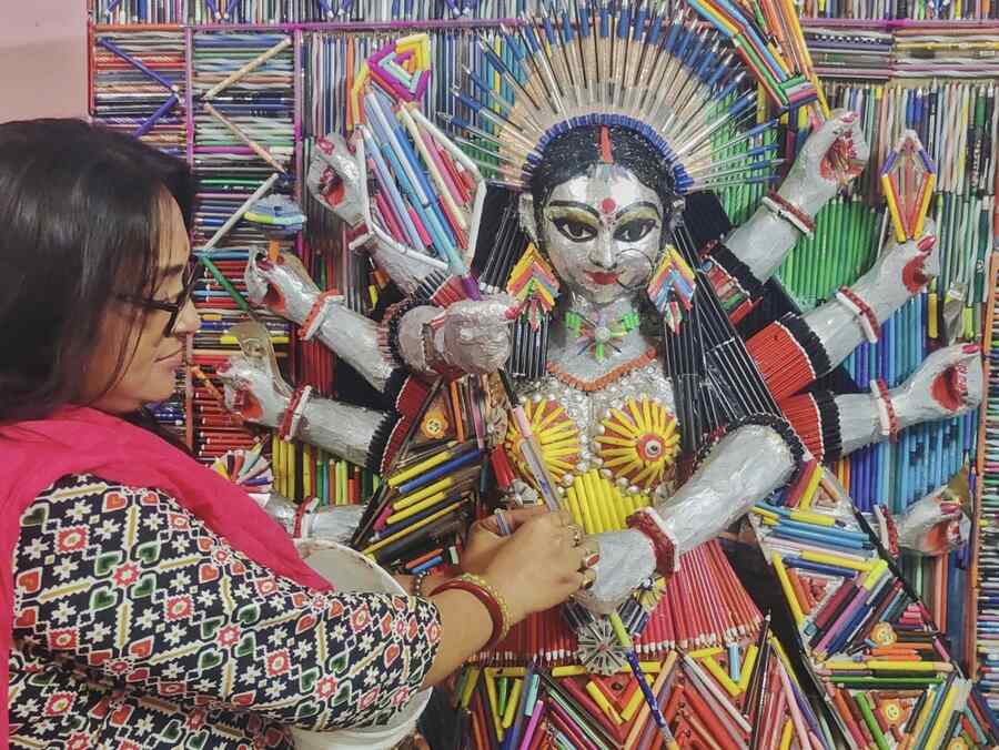 Papiya Kar, a homemaker from Nadia’s Krishnaganj, has recycled discarded pens and pencils to make a Durga idol. It took her nine months to finish the work of art