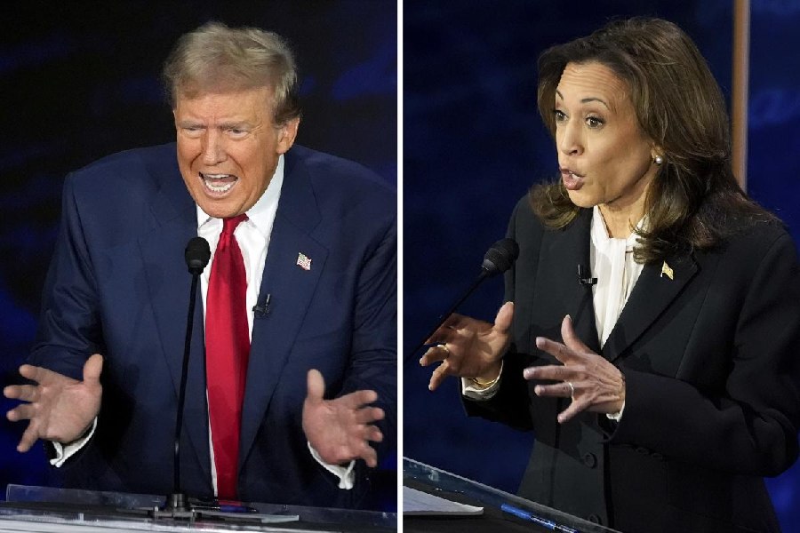 This combination of photos shows Republican presidential nominee former President Donald Trump, left, and Democratic presidential nominee Vice President Kamala Harris during an ABC News presidential debate at the National Constitution Center.