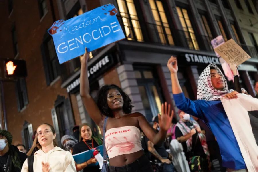 Pro-Palestinian protesters march through the streets during the presidential debate in Philadelphia.