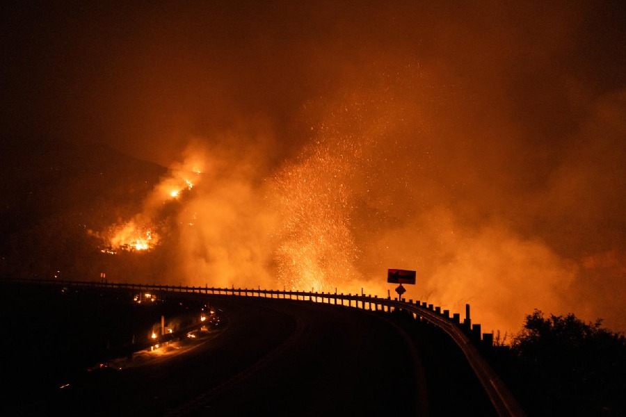 Line Fire burns in the mountains over Highland, California, U.S.
