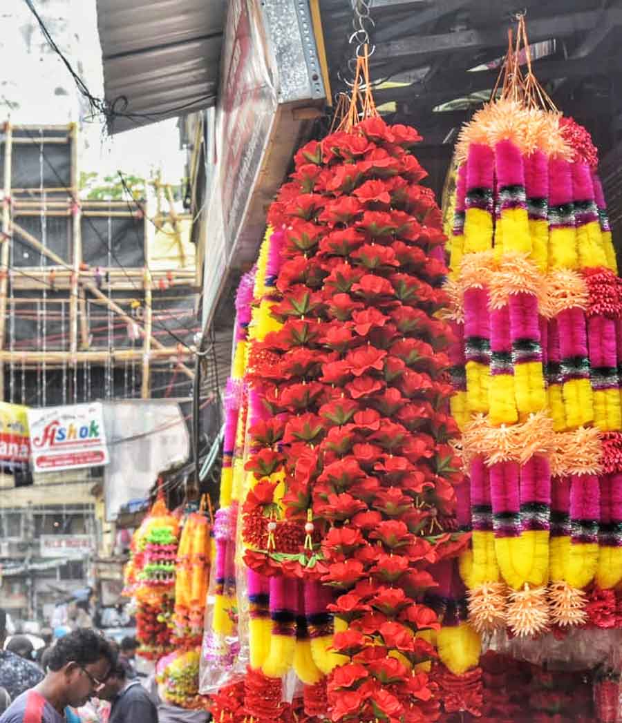 Garlands of artificial flowers on sale in central Kolkata ahead of Vishwakarma Puja 