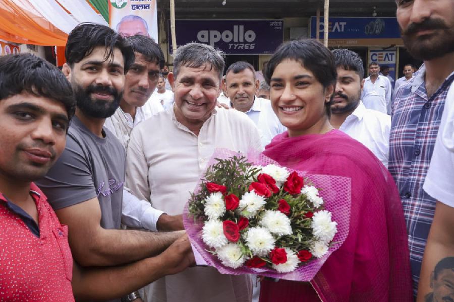 Former wrestler and Congress candidate from Julana constituency Vinesh Phogat being felicitated during her election campaign for the upcoming Haryana Assembly, in Jind district, Haryana.