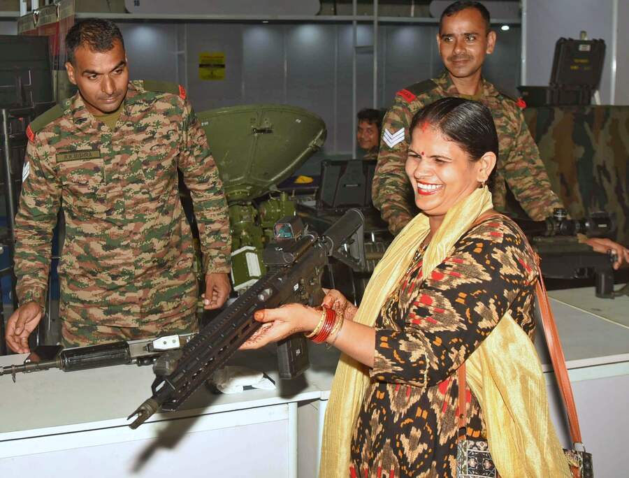 A visitor tries her hand at an automatic machine gun from the Indian Army showcased at the 27th National Defence Exhibition at Science City. It will continue till September 14 between 11am and 7pm.  The theme of the exhibition this year is ‘India Developed Nation by 2047’