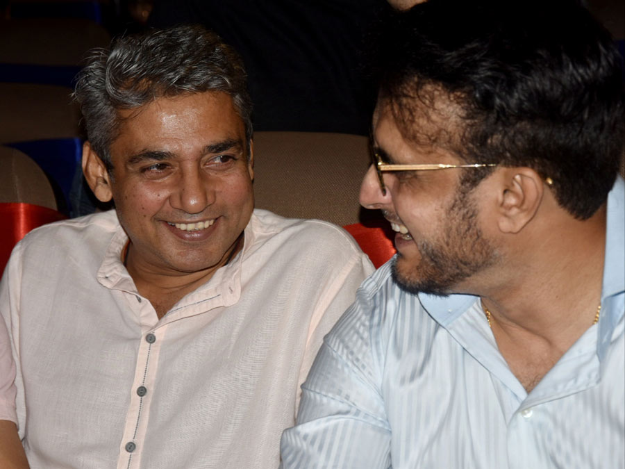 Former cricketers Ajay Jadeja and Sourav Ganguly share a light moment at the Cricket Association of Bengal annual awards ceremony at Dhono Dhanyo auditorium in Alipore on Saturday