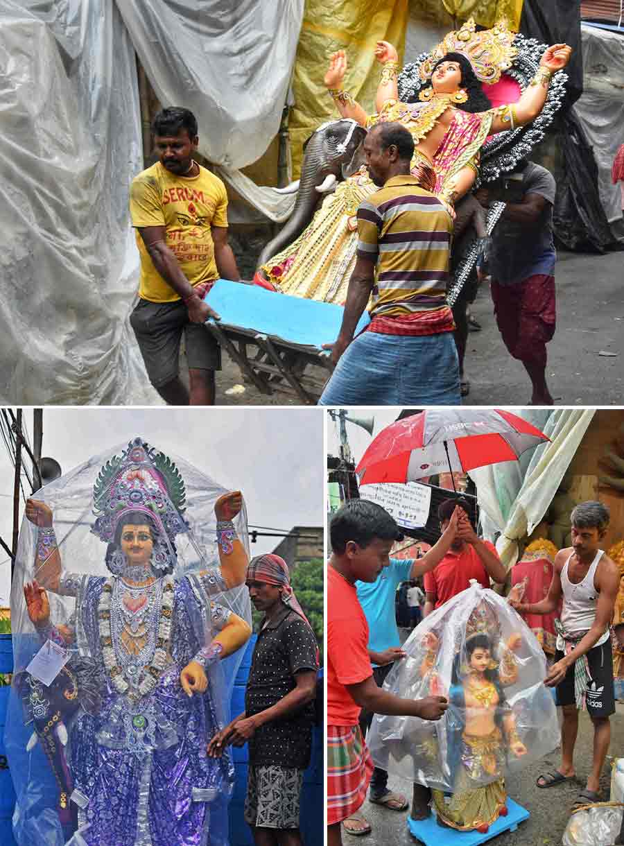 Vishwakarma idols wrapped in plastic as protection from the incessant rain on the way to pandals, where they will be worshipped on September 17. The total rainfall recorded between September 14 and 15 is 30.2mm  