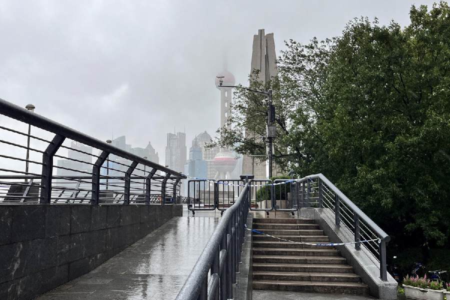 olice cordons are seen at a closed entrance to the Bund after Typhoon Bebinca made landfall in Shanghai, China September 16, 2024.